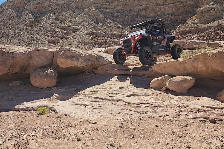 Experience the thrill of navigating rugged desert terrains in a Polaris RZR where adventure meets stunning natural vistas for an unforgettable exploration of Las Vegas's wild side.